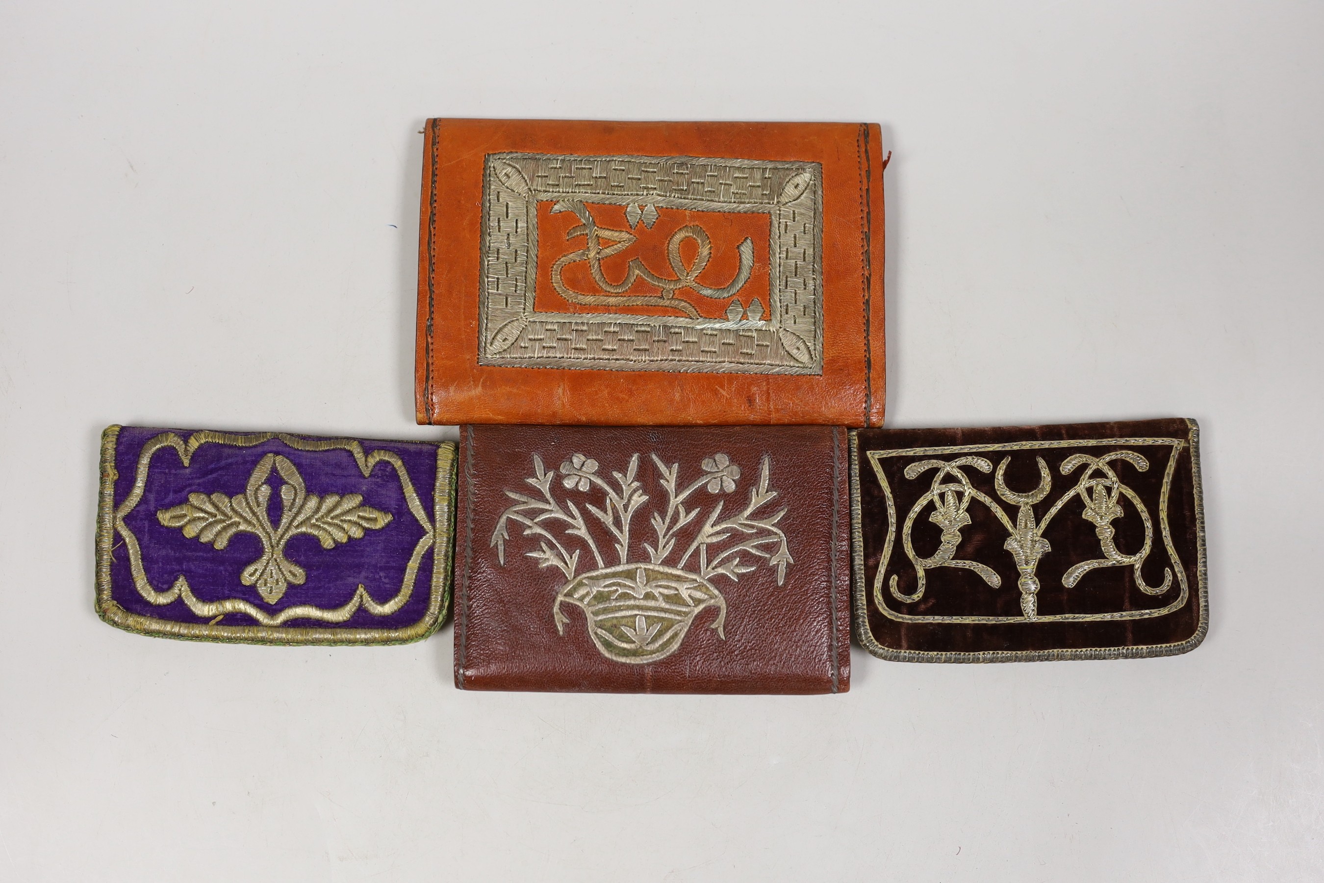 Four Turkish gold and silver metallic embroidered purses, two 19th century, embroidered on velvet and two early 20th century, embroidered on Morocco leather